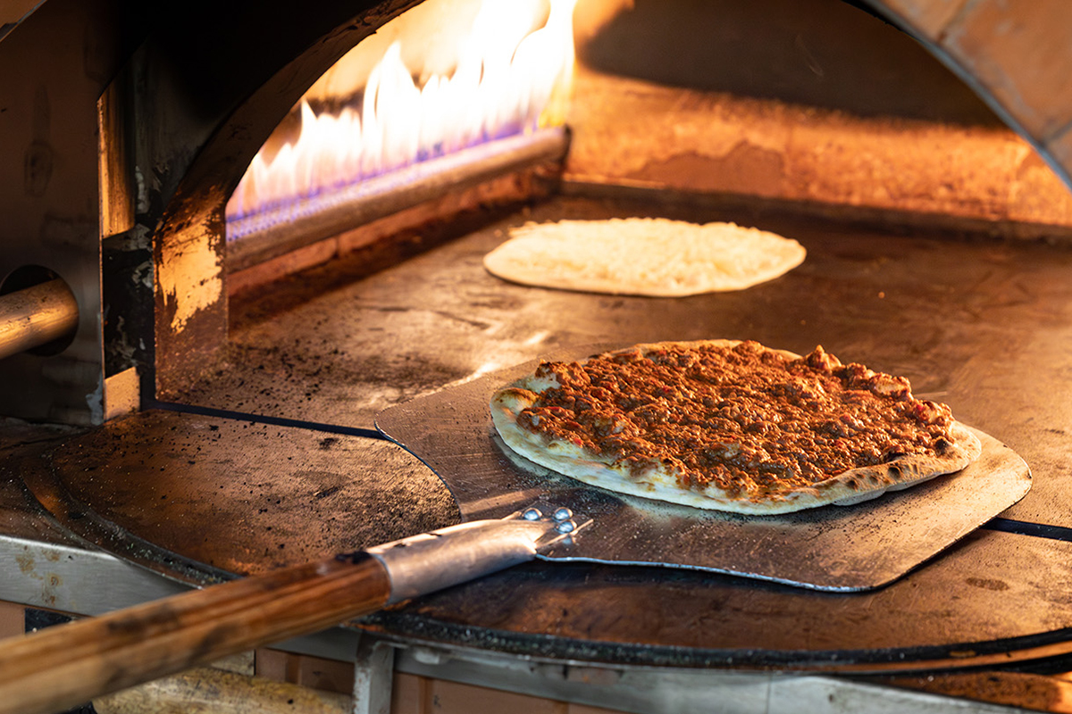 flat bread pizza on the hearth